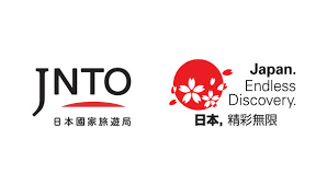 Scenic view of snow-capped mountains and a hot spring in Hokkaido