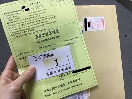 Vibrant street scene in Osaka with neon signs and street food stalls